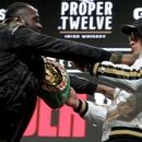 US boxer Deontay Wilder (L) and British boxer Tyson Fury get into an altercation during their press conference February 19, 2020 at the MGM Grand Las Vegas in Las Vegas, Nevada. - The boxers will fight for the World Boxing Council (WBC) Heavyweight Championship Title on February 22, 2020 at the MGM Grand Garden Arena in Las Vegas. (Photo by John Gurzinski / AFP)