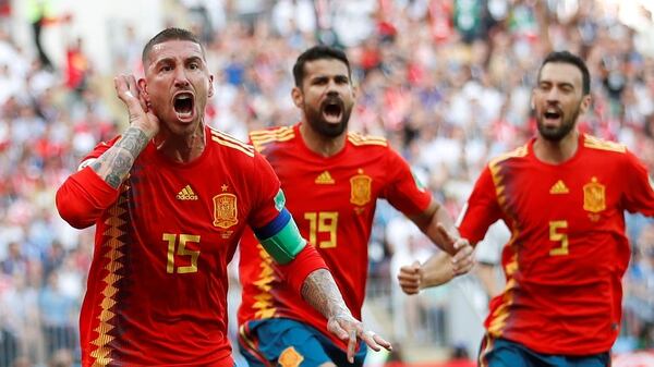 Soccer Football – World Cup – Round of 16 – Spain vs Russia – Luzhniki Stadium, Moscow, Russia – July 1, 2018 Spain’s Sergio Ramos celebrates with team mates after Russia’s Sergei Ignashevich scored an own goal and the first goal for Spain REUTERS/Carl Recine