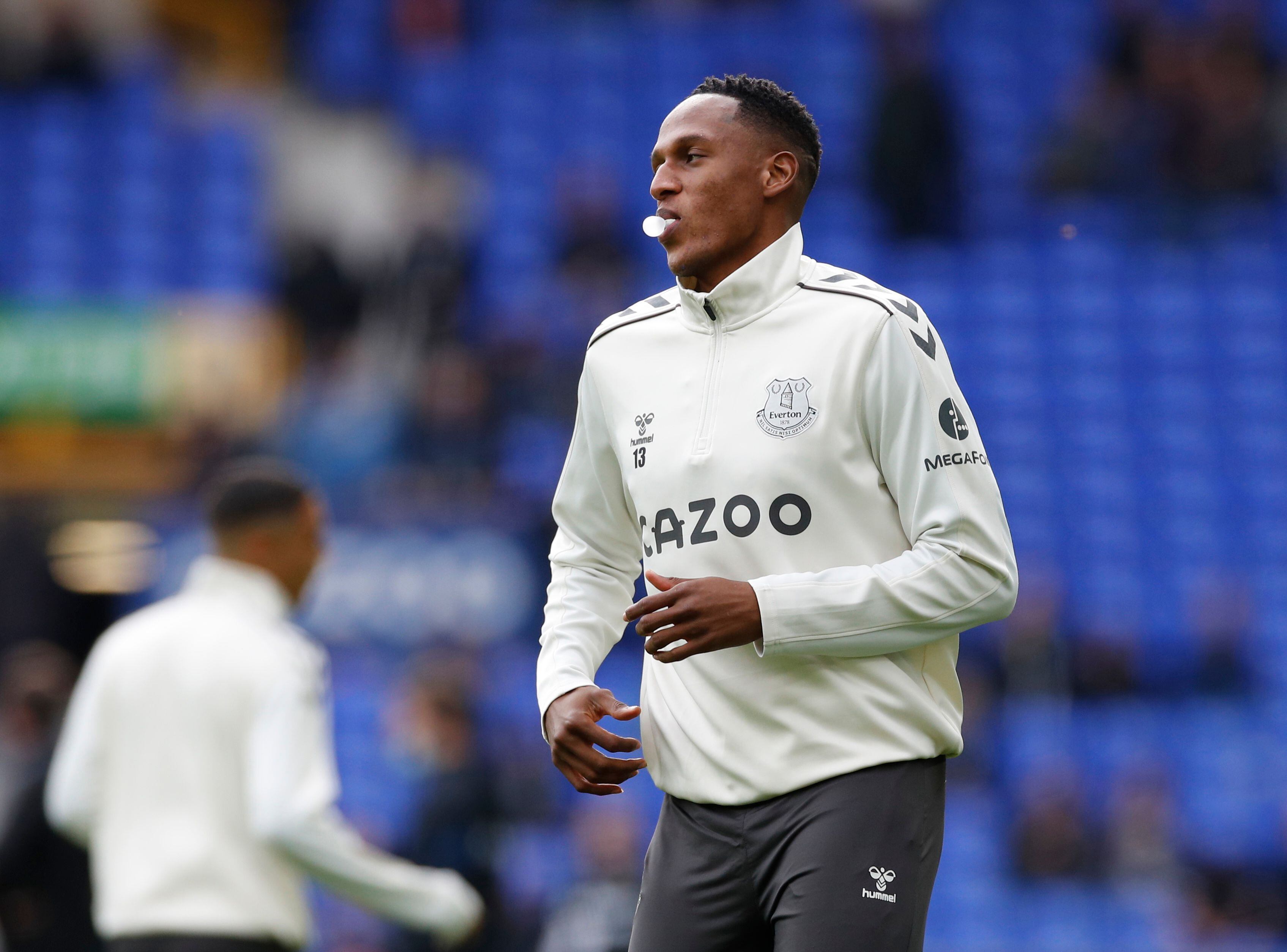 Soccer Football - Premier League - Everton v West Ham United - Goodison Park, Liverpool, Britain - October 17, 2021 Everton's Yerry Mina during the warm up before the match REUTERS/Phil Noble EDITORIAL USE ONLY. No use with unauthorized audio, video, data, fixture lists, club/league logos or 'live' services. Online in-match use limited to 75 images, no video emulation. No use in betting, games or single club /league/player publications.  Please contact your account representative for further details.