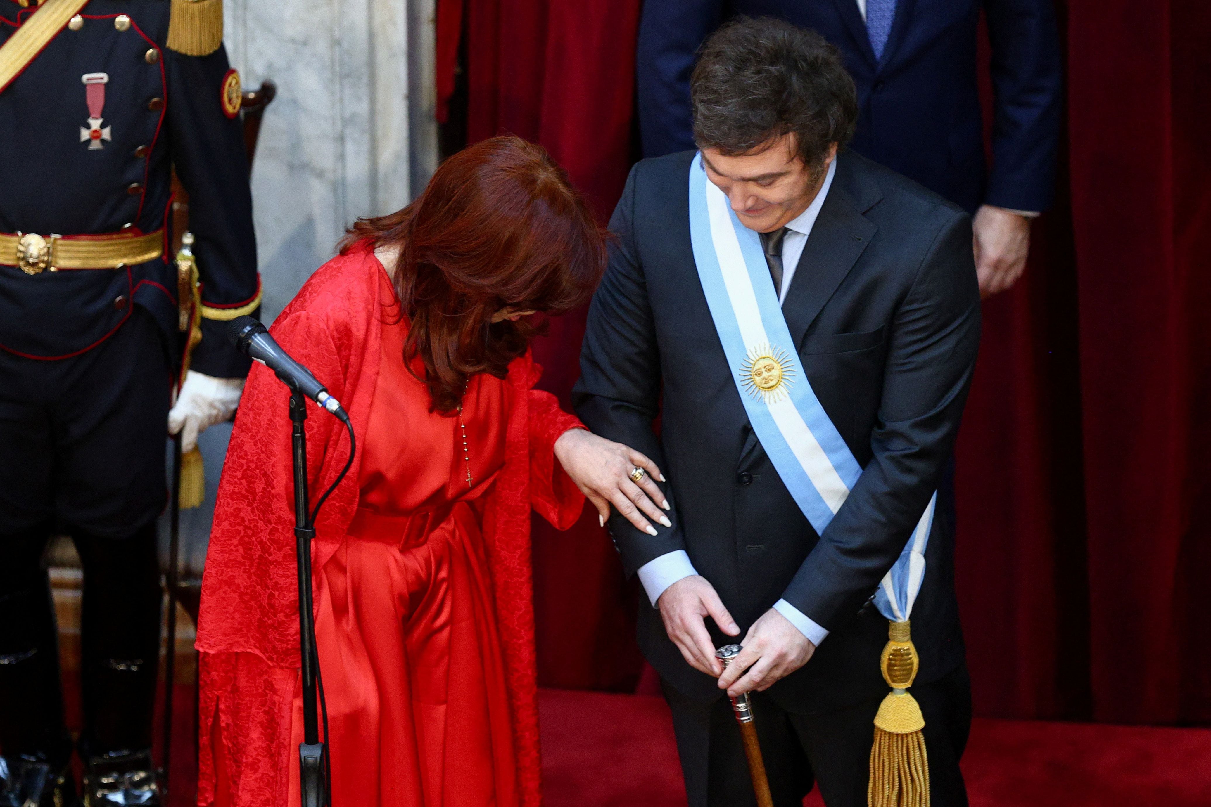 Cristina Fernandez de Kirchner looks at the symbolic leader's staff of Argentina's President Javier Milei during his swearing-in ceremony at the National Congress, in Buenos Aires, Argentina December 10, 2023. REUTERS/Matias Baglietto