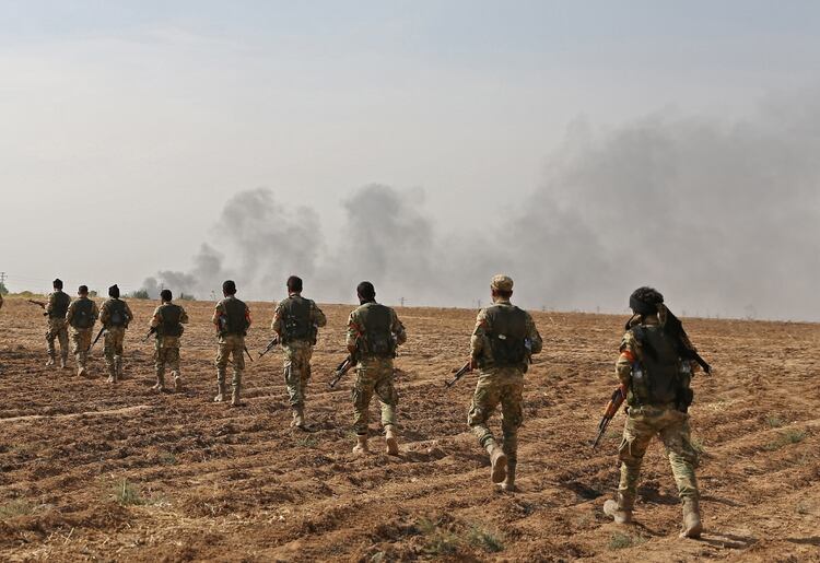 Milicias pro turcas invaden el territorio controlado por los kurdos en el norte de Siria (Photo by Nazeer Al-khatib / AFP)