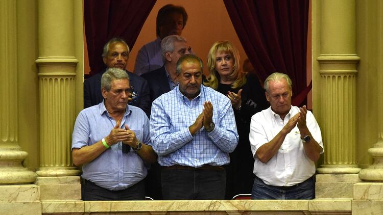 Los sindicalistas Carlos Acuña, Héctor Daer y Andrés Rodríguez (Franco Fafasuli)