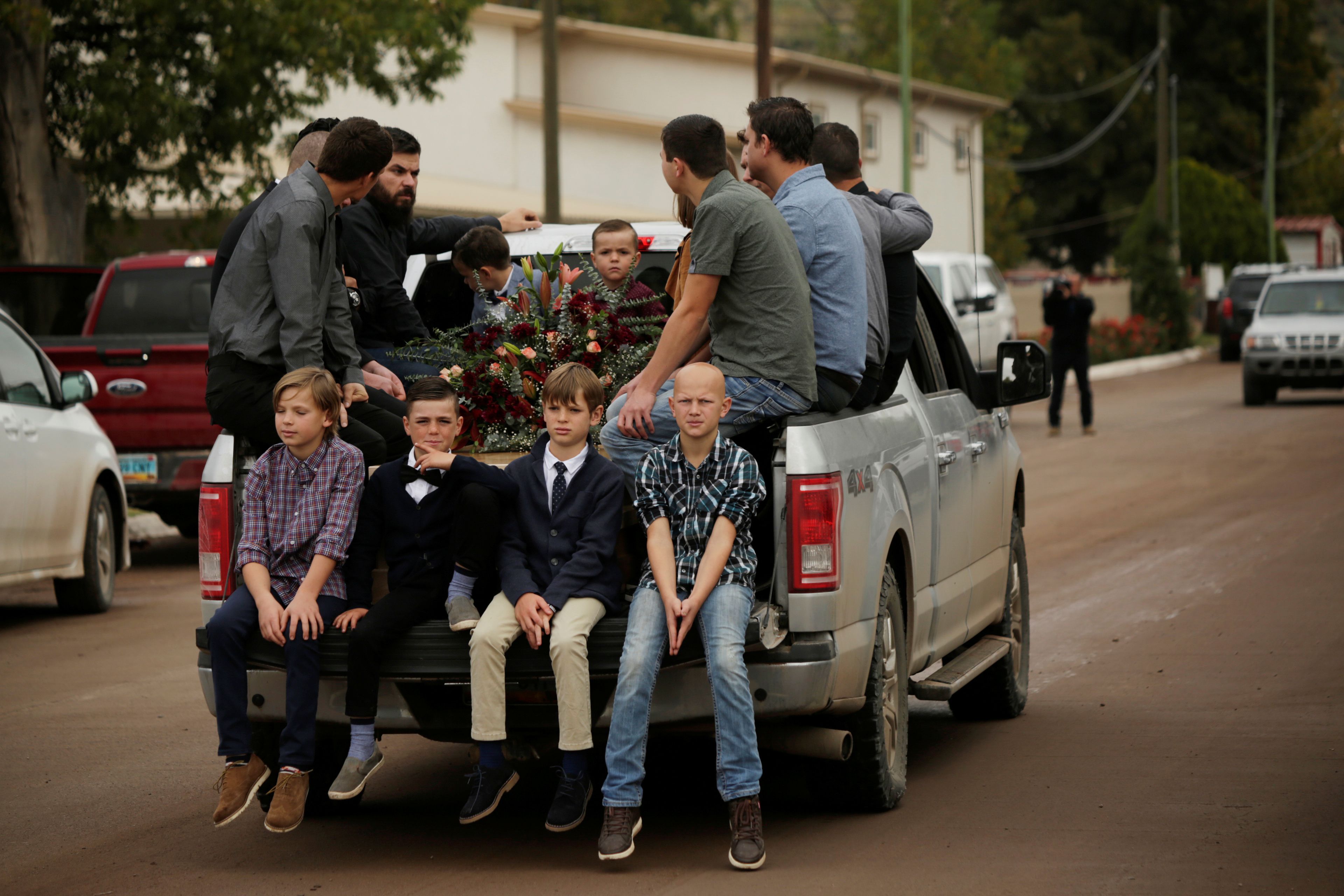 Relatives of Christina Marie Langford Johnson, who was killed by unknown assailants, accompany her coffin during the funeral service, before a burial at the cemetery in LeBaron, Chihuahua, Mexico November 9, 2019. REUTERS/Jose Luis Gonzalez