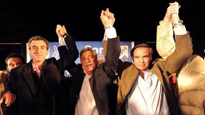 El ex ministro del Interior, Florencio Randazzo y el ex senador Miguel Pichetto junto a Soria, un mes antes del crimen (Foto NA)
