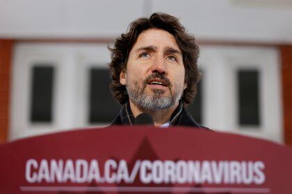 FILE PHOTO: Canada's Prime Minister Justin Trudeau attends a news conference at Rideau Cottage, as efforts continue to help slow the spread of the coronavirus disease (COVID-19), in Ottawa, Ontario, Canada January 22, 2021. REUTERS/Blair Gable/File Photo