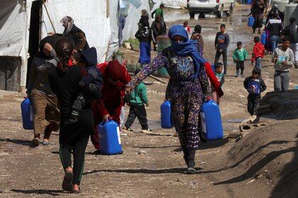 Refugiados sirios. REUTERS/Mohamed Azakir/Files/File Photo