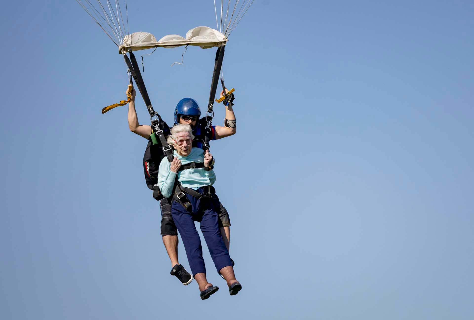 Dorothy Hoffner, 104, becomes the oldest person in the world to skydive with tandem jumper Derek Baxter on Sunday, Oct. 1, 2023, at Skydive Chicago in Ottawa, Ill. (Brian Cassella/Chicago Tribune via AP)