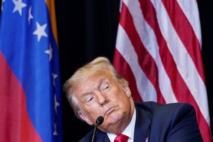 U.S. President Donald Trump listens during a roundtable discussion on Venezuela as he visits Iglesia Doral Jesus Worship Center in Doral, Florida, U.S., July 10, 2020. REUTERS/Kevin Lamarque