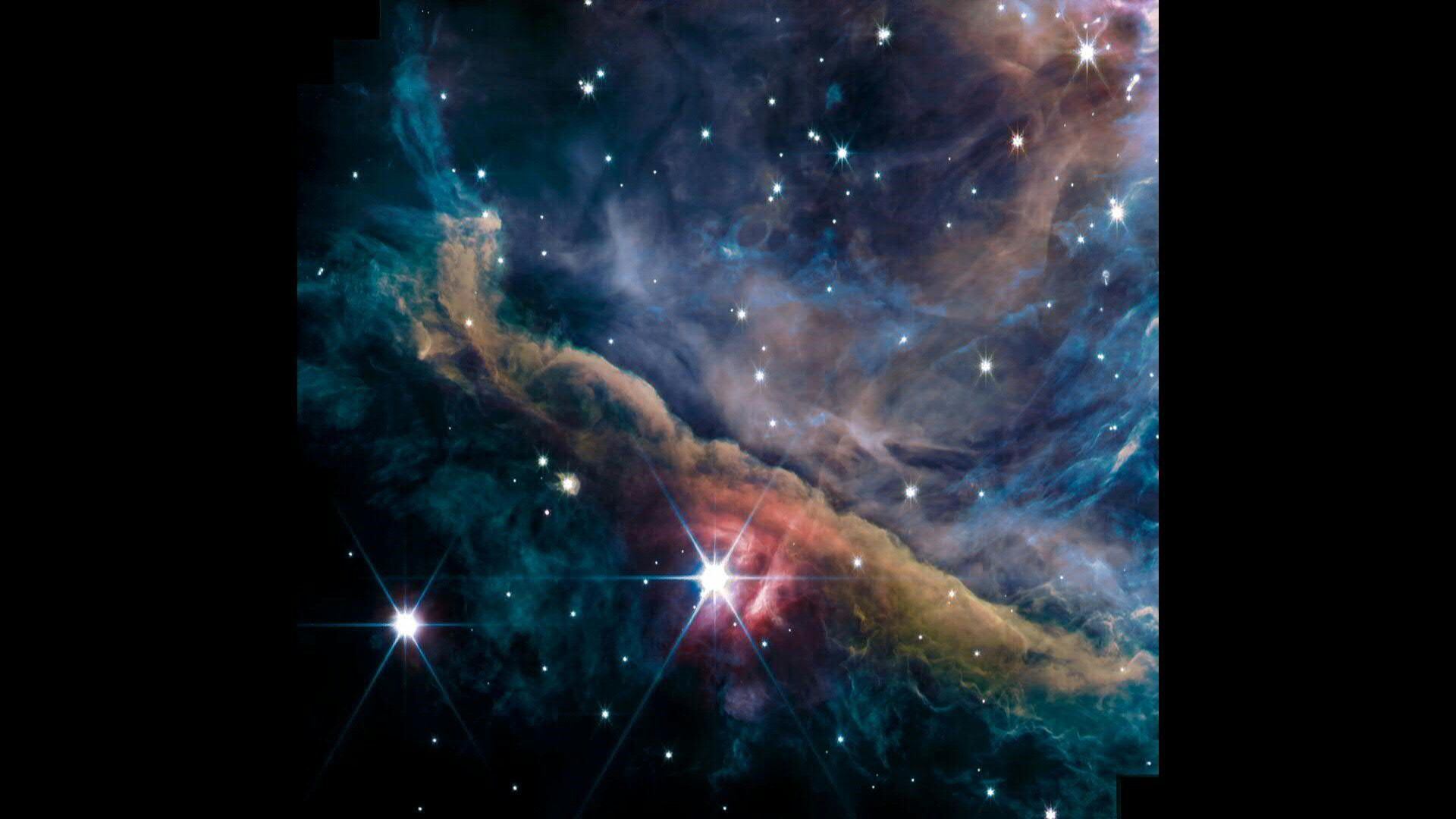 El telescopio espacial James Webb capturó las primeras imágenes de la nebulosa de Orión, que dejaron a los astrónomos "impresionados", reveló el lunes un equipo de investigación internacional. (NASA)