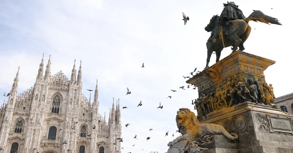 Environmental activists vandalized a monumental statue in Milan’s Piazza del Duomo