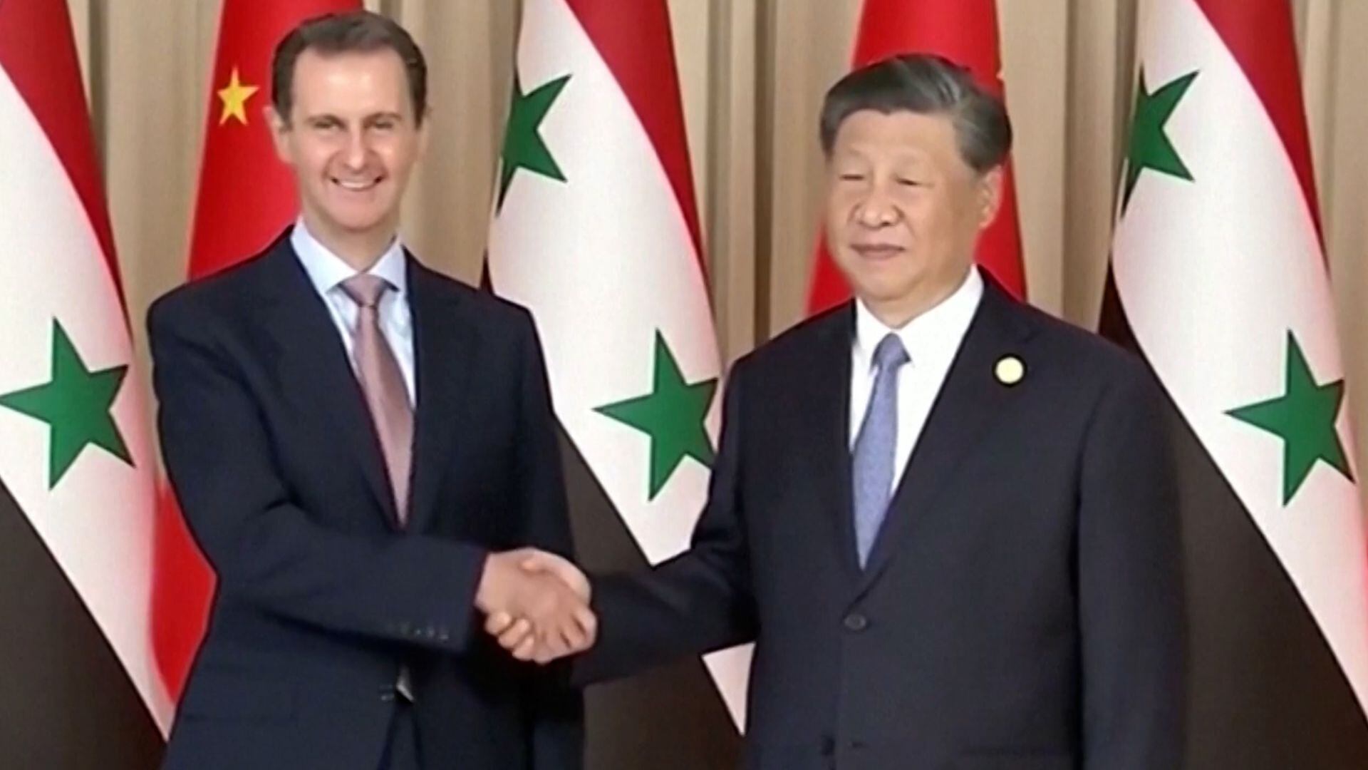 Xi Jinping y Bashar al Assad