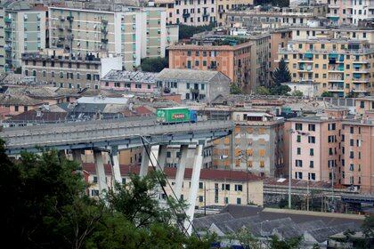 FILE PHOTO: The collapsed Morandi Bridge is seen in the Italian port city of Genoa, Italy August 14, 2018.  REUTERS/Stefano Rellandini/File Photo