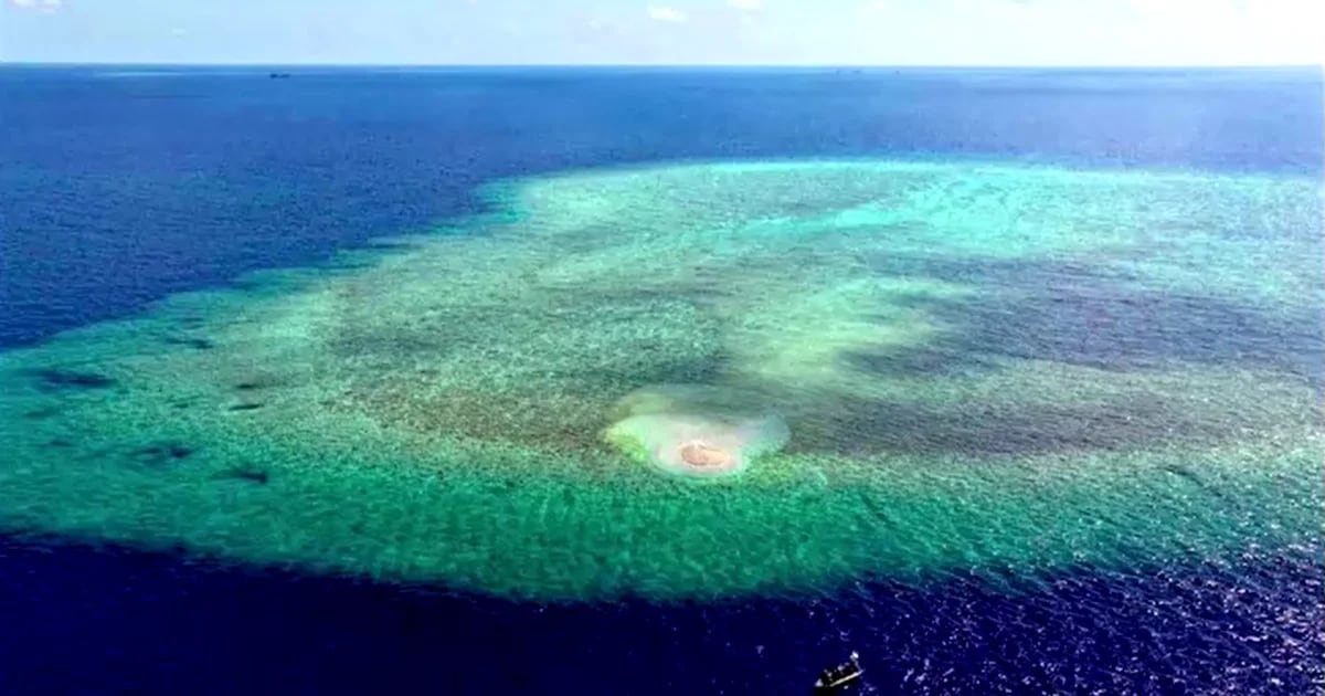 The Philippines accused China of destroying coral reefs to build an artificial island within its maritime zone