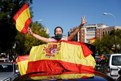 Una partidaria de Vox durante el acto organizado en Madrid (REUTERS/Juan Medina)