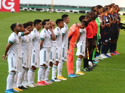 Soccer Football - Concacaf Olympic Qualifiers - Mexico v Dominican Republic - Estadio Jalisco, Guadalajara, Mexico - March 18, 2021 Players and referees lineup before the match REUTERS/Henry Romero