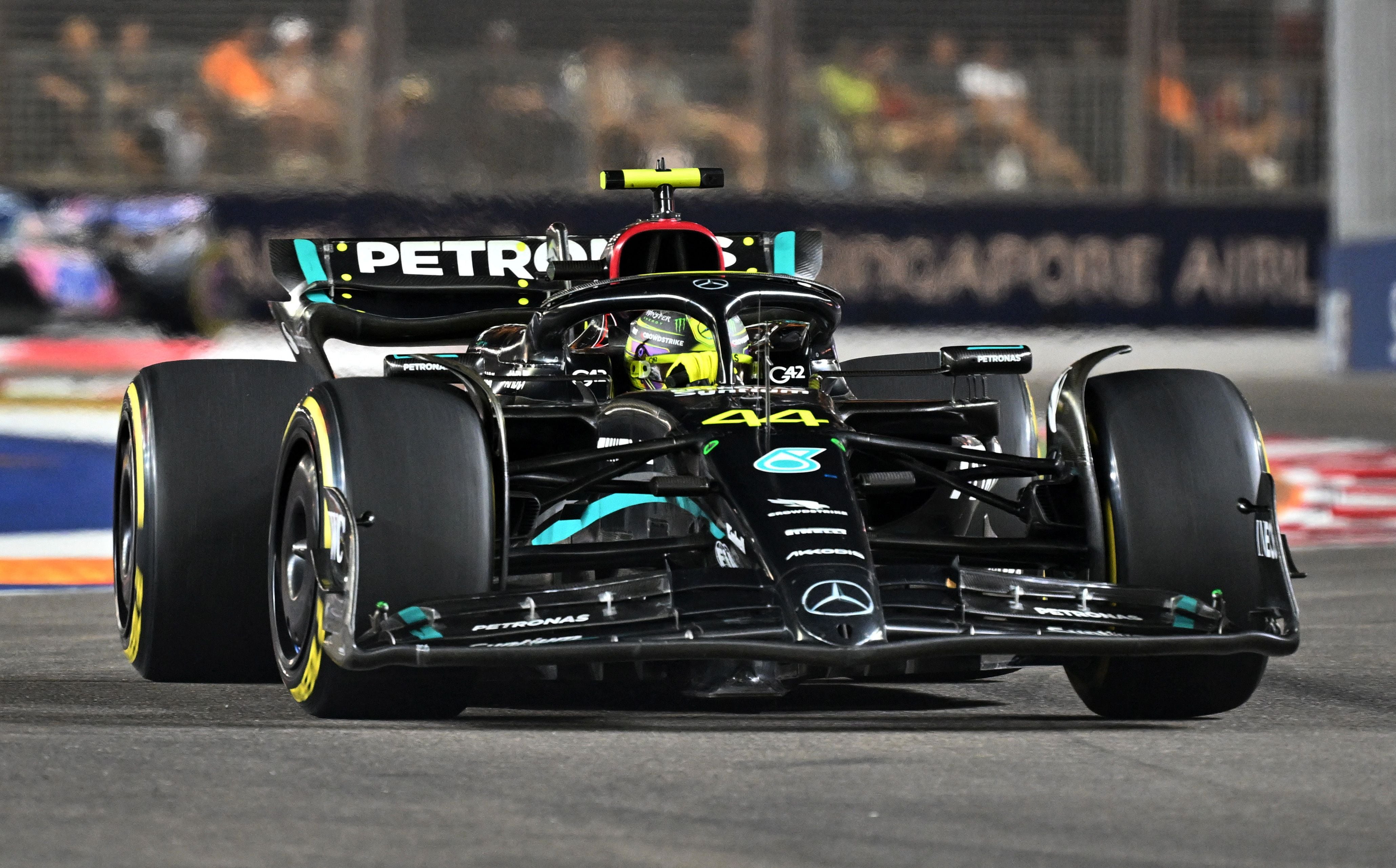 Lewis Hamilton completó el podio en Marina Bay (REUTERS/Andy Chua)