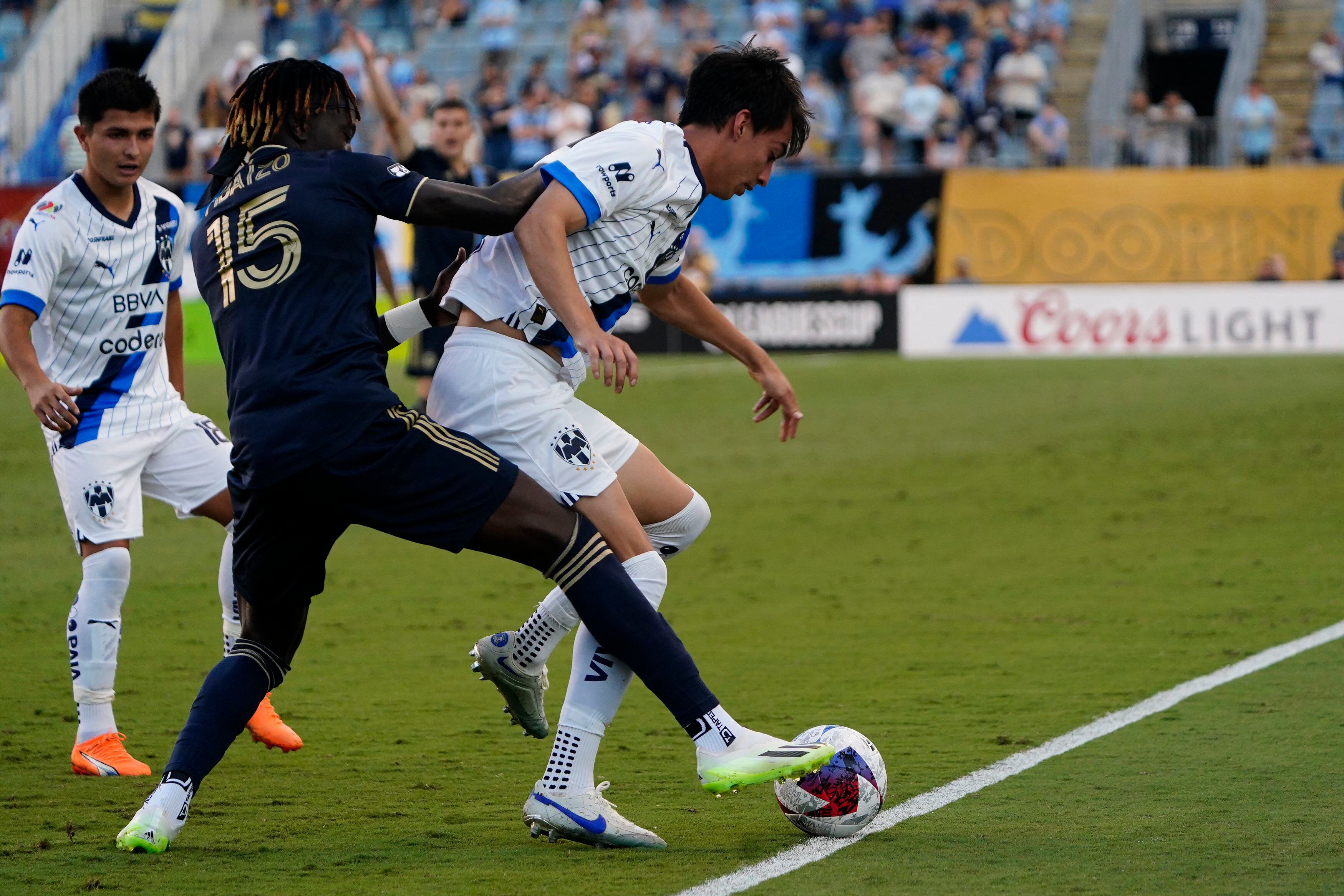 Aug 19, 2023; Chester, PA, USA; Philadelphia Union defender Olivier Mbaizo (15) and CF Monterrey defender Daniel Parra (right) battle for the ballduring the second half at Subaru Park. Mandatory Credit: Gregory Fisher-USA TODAY Sports