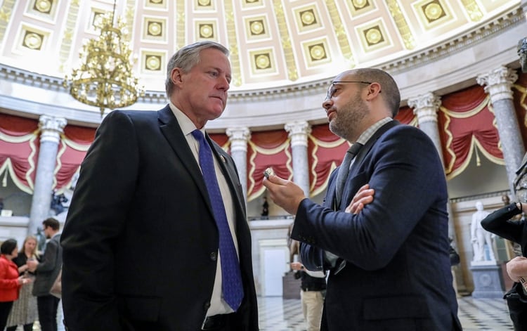 U.S. Rep. Mark Meadows (R-NC) walks past a reporter at the U.S. Capitol prior to votes in the U.S. House of Representatives on two articles of impeachment against U.S. President Donald Trump in Washington, U.S., December 18, 2019. REUTERS/Jonathan Ernst