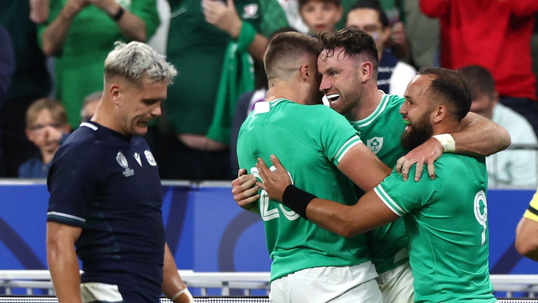 Rugby Union - Rugby World Cup 2023 - Pool B - Ireland v Scotland - Stade de France, Saint-Denis, France - October 7, 2023 Ireland's Hugo Keenan celebrates scoring their second try with Stuart McCloskey and Jamison Gibson-Park REUTERS/Stephanie Lecocq