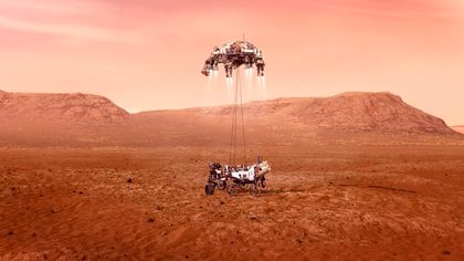 Imagen cedida por la NASA que muestra una ilustración del rover Perseverance mientras aterriza de forma segura sobre la superficie de Marte. EFE/ Emma Howells/ NASA

