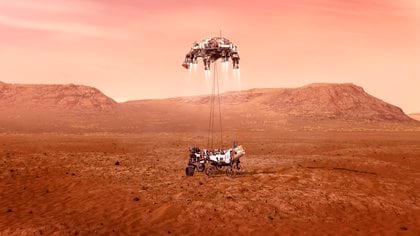 Imagen cedida por la NASA que muestra una ilustración del rover Perseverance mientras aterriza de forma segura sobre la superficie de Marte. EFE/ Emma Howells/ NASA