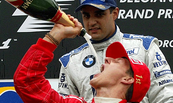 Juan Pablo Montoya y Michael Schumacher protagonizaron una intensa rivalidad en las pistas durante los años 2000 - crédito AP