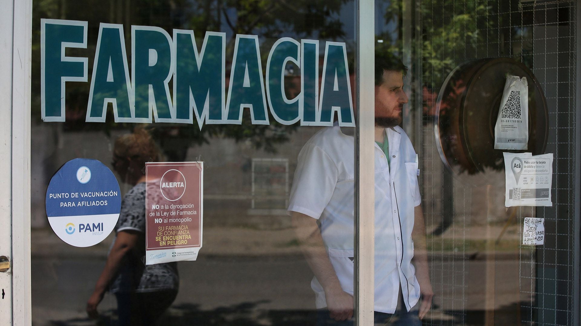 Emiliano Di Ilio looks out of his pharmacy in Buenos Aires, Argentina November 21, 2018. Picture taken November 21, 2018.  REUTERS/Agustin Marcarian