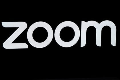 FILE PHOTO: The Zoom Video Communications logo is pictured at the NASDAQ MarketSite in New York, New York, U.S., April 18, 2019.  REUTERS/Carlo Allegri/File Photo