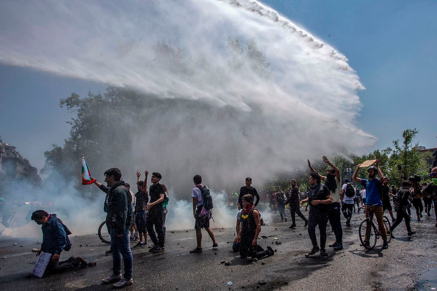 Manifestantes en las calles de Santiago (Foto: Claudio Reyes/ AFP)