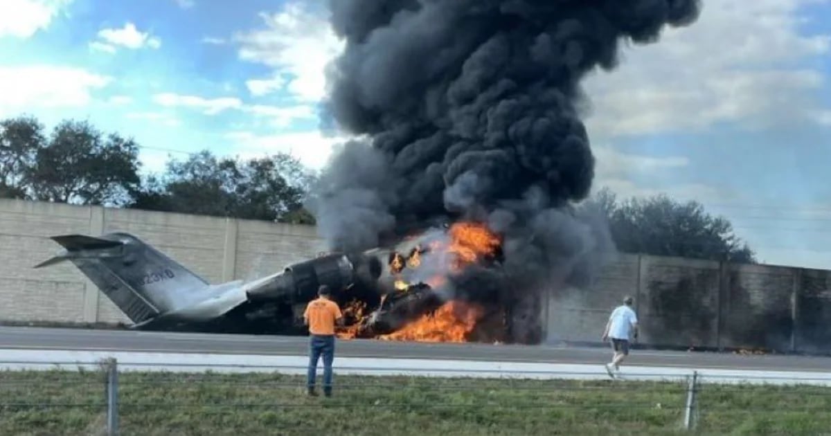 Two people are dead after a private plane crashes into a vehicle on a Florida highway