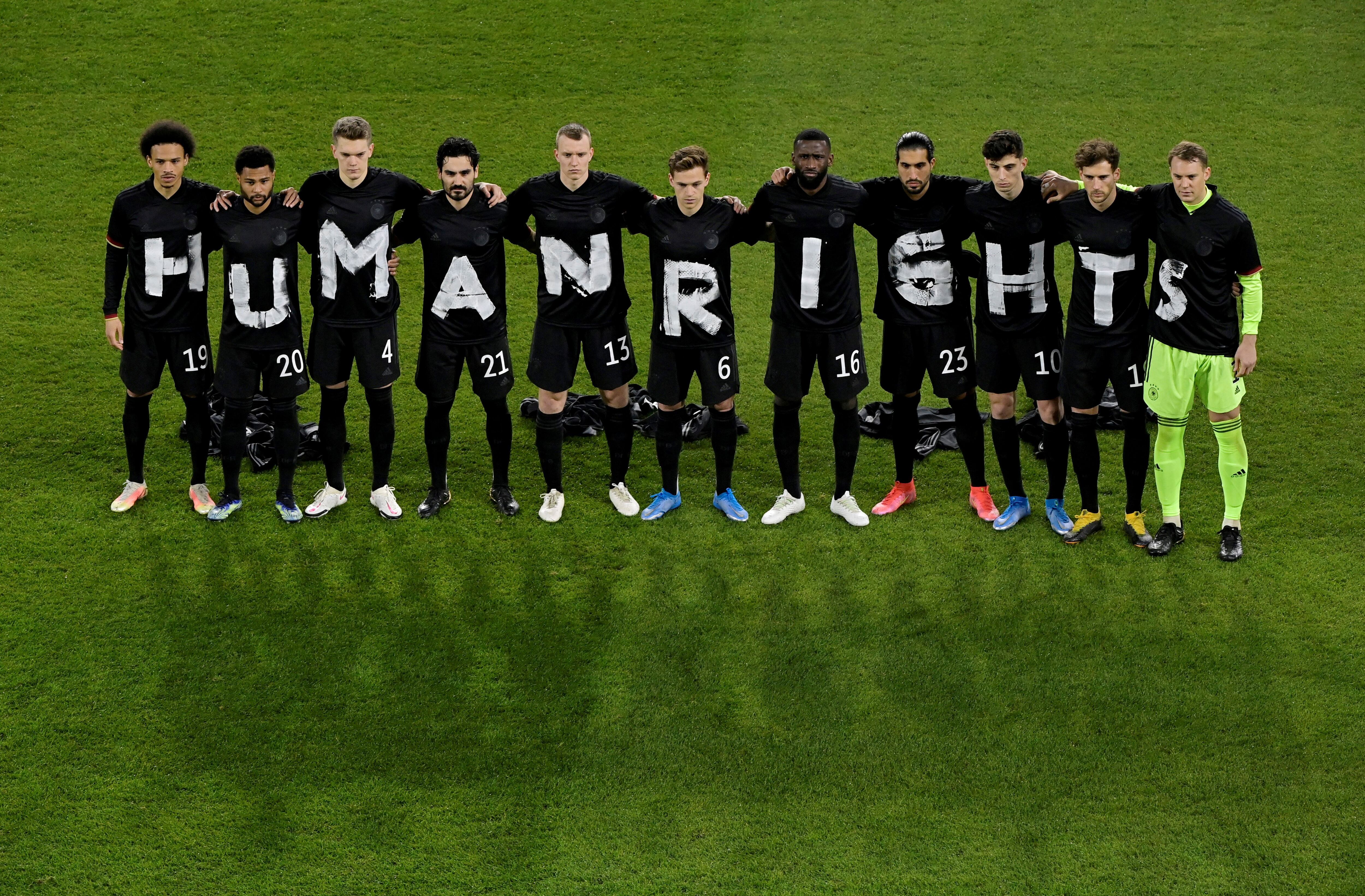 Germany's players posed for a photo displaying a Human Rights message on their jerseys before the game against Iceland (Photo: Reuters)