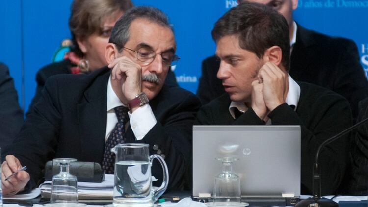 Guillermo Moreno y Axel Kicillof, juntos, cuando eran funcionarios del gobierno de Cristina Kirchner (foto NA)