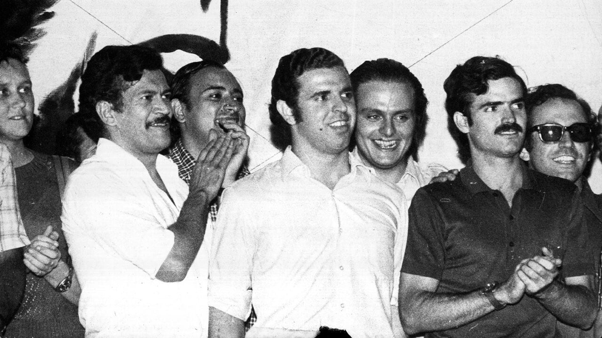 Firmenich, Roberto Quieto, Fernando Vaca Narvaja y detrás un sonriente Galimberti