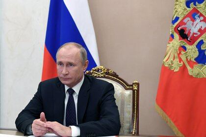 Russian President Vladimir Putin attends a meeting with members of the Security Council via a video link in Moscow, Russia November 27, 2020. Sputnik/Aleksey Nikolskyi/Kremlin via REUTERS ATTENTION EDITORS - THIS IMAGE WAS PROVIDED BY A THIRD PARTY.