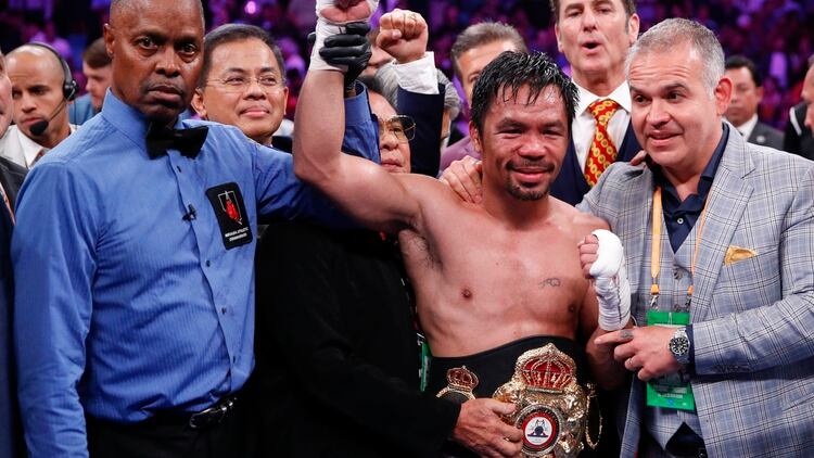 Con este imponente triunfo, Pacquiao logró unificar la corona peso wélter de la Asociación Mundial de Boxeo (Foto: AP)
