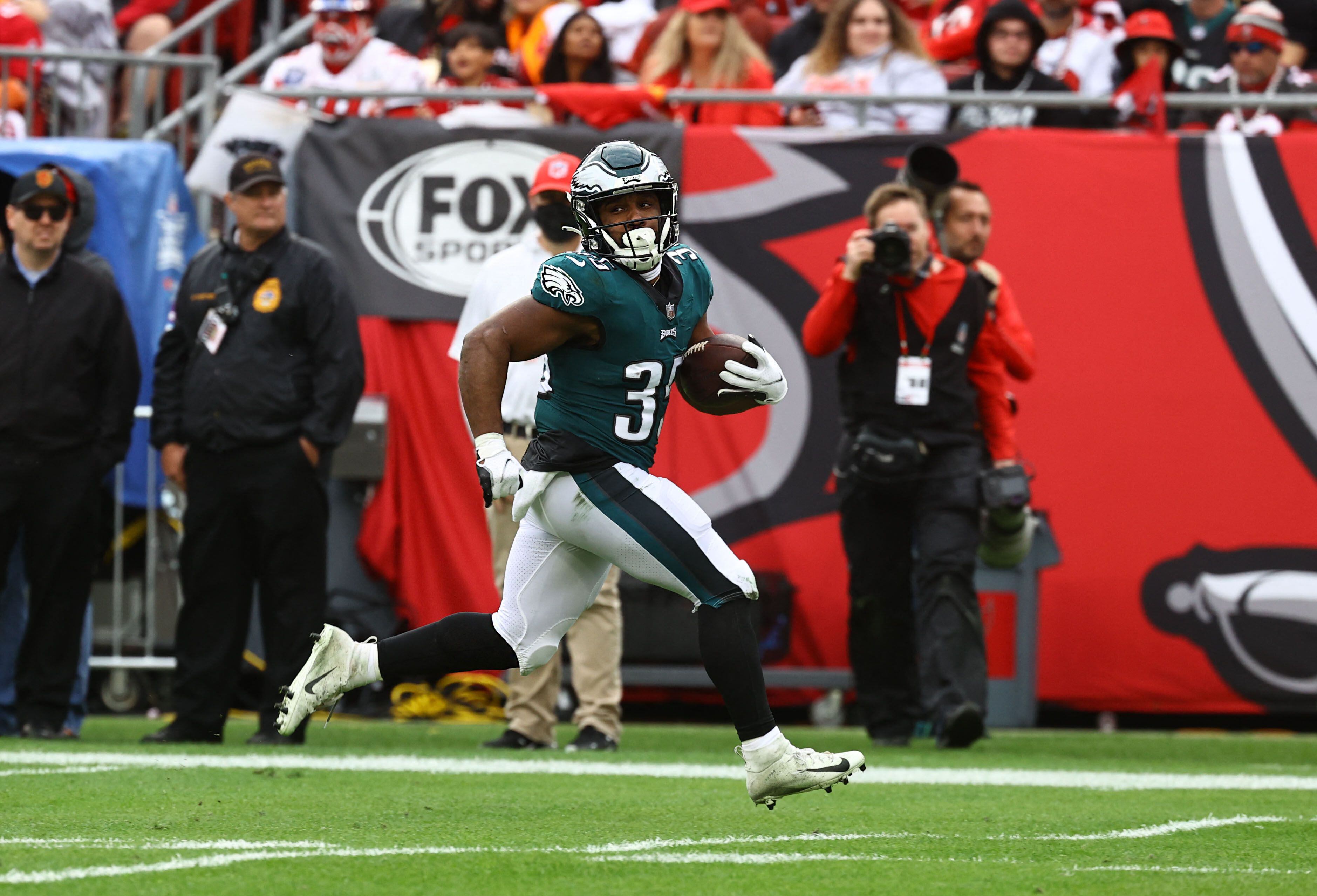Jan 16, 2022; Tampa, Florida, USA; Philadelphia Eagles running back Boston Scott (35) scores a touchdown  against the Tampa Bay Buccaneers during the second half in a NFC Wild Card playoff football game at Raymond James Stadium. Mandatory Credit: Kim Klement-USA TODAY Sports