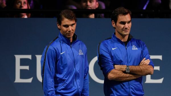 AFP PHOTO / Michal Cizek Nadal y Federer jugaron juntos en dobles el año pasado