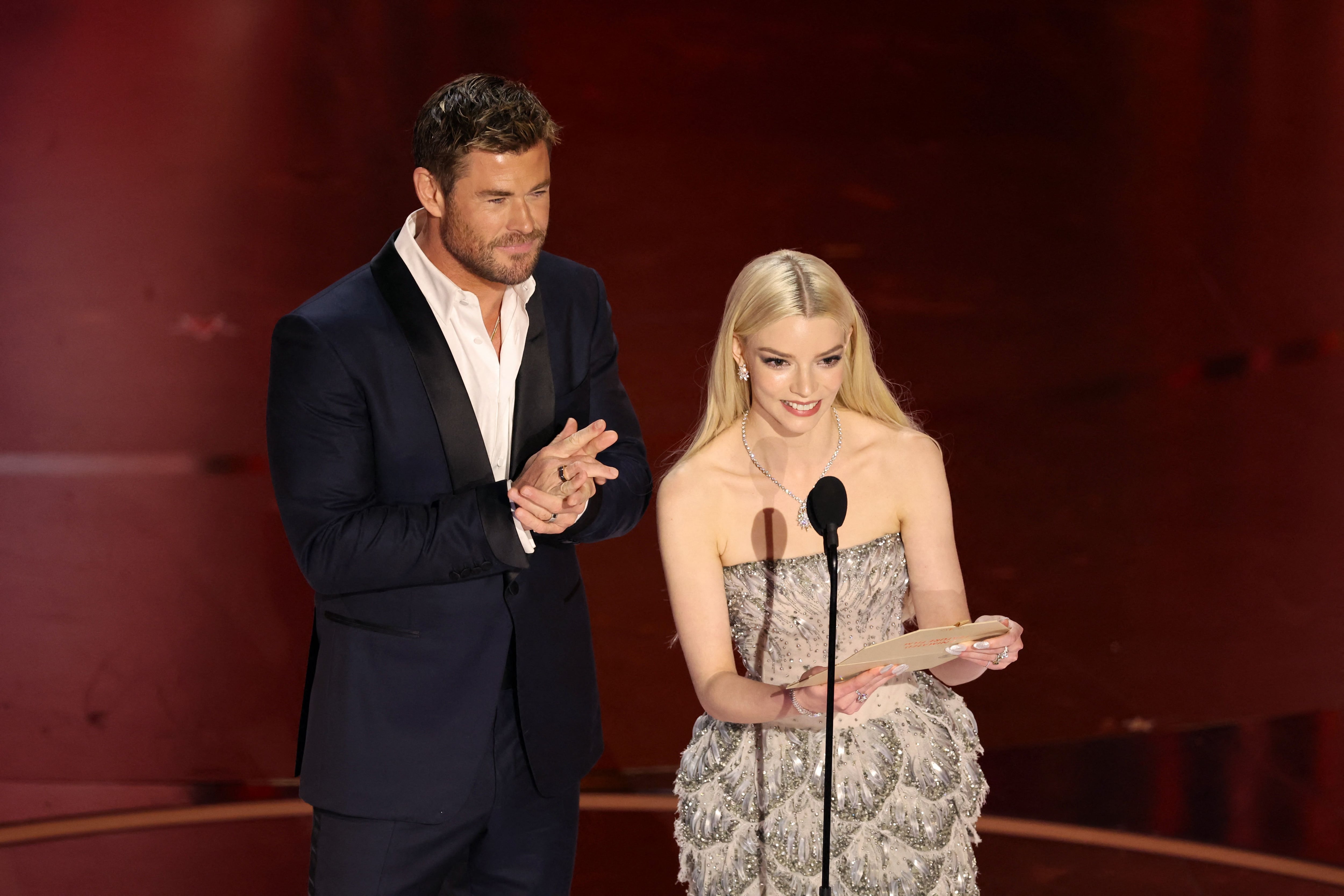 Anya Taylor-Joy and Chris Hemsworth announce the winner for the Oscar for Best Animated Feature Film for "The Boy and the Heron" during the Oscars show at the 96th Academy Awards in Hollywood, Los Angeles, California, U.S., March 10, 2024. REUTERS/Mike Blake