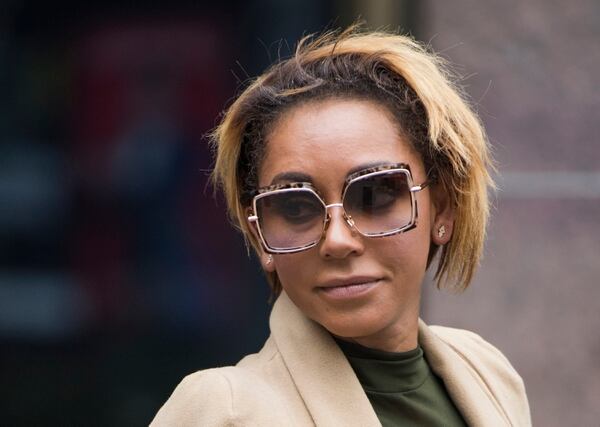 Melanie Brown (la ex Spice Girl Mel B) dejando la corte de Los Angeles (AFP PHOTO /Robyn Beck)