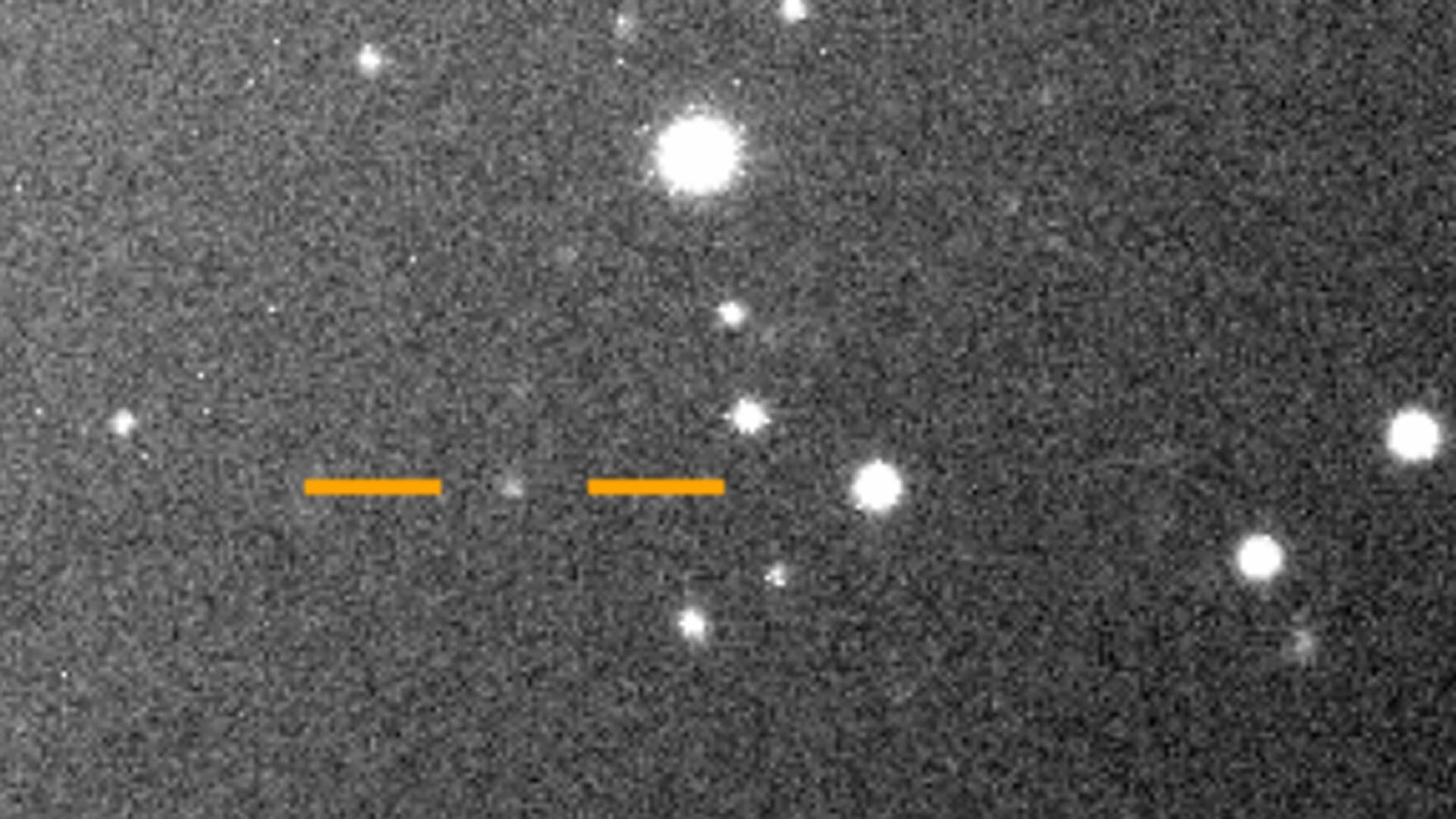 Una de las nuevas 20 lunas es captada por el telescopio en Hawai