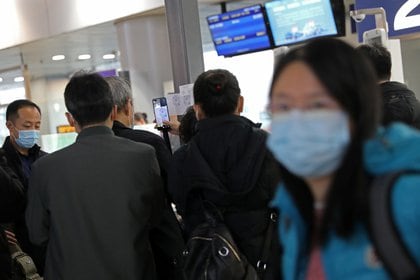 Pasajeros en el aeropuerto de Beijing (Reuters)