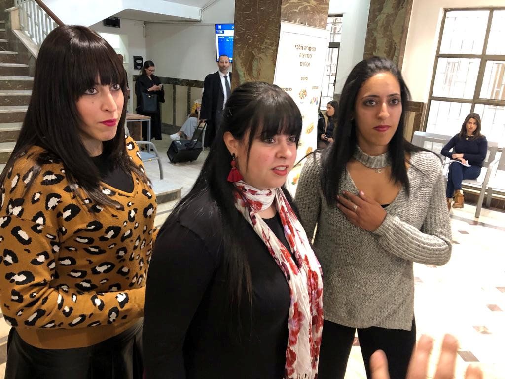 Australian women, Nicole Meyers, Dassi Erlich and Ellie Sapper speak to members of the media following a court hearing in the case of Malka Leifer at the District Court in Jerusalem March 6, 2019. REUTERS/Sinan Abu Mizar