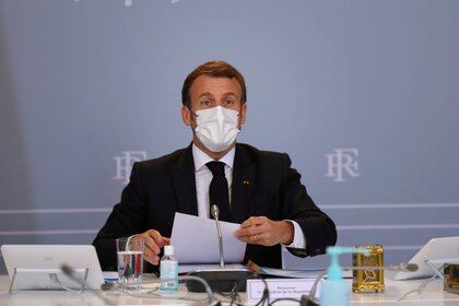 French President Emmanuel Macron attends a defence council on the coronavirus pandemic at Elysee Palace in Paris, France November 12, 2020. Thibault Camus/Pool via REUTERS