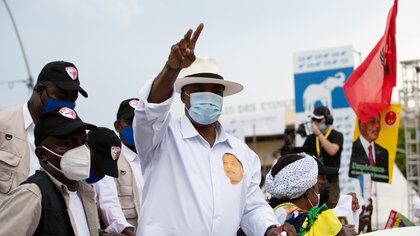President  and candidate for the presidential elections Denis Sassou Nguesso waves to a crowd at an election rally in Brazzaville, Republic of Congo, on March 19, 2021. REUTERS/Hereward Holland  NO RESALES. NO ARCHIVES