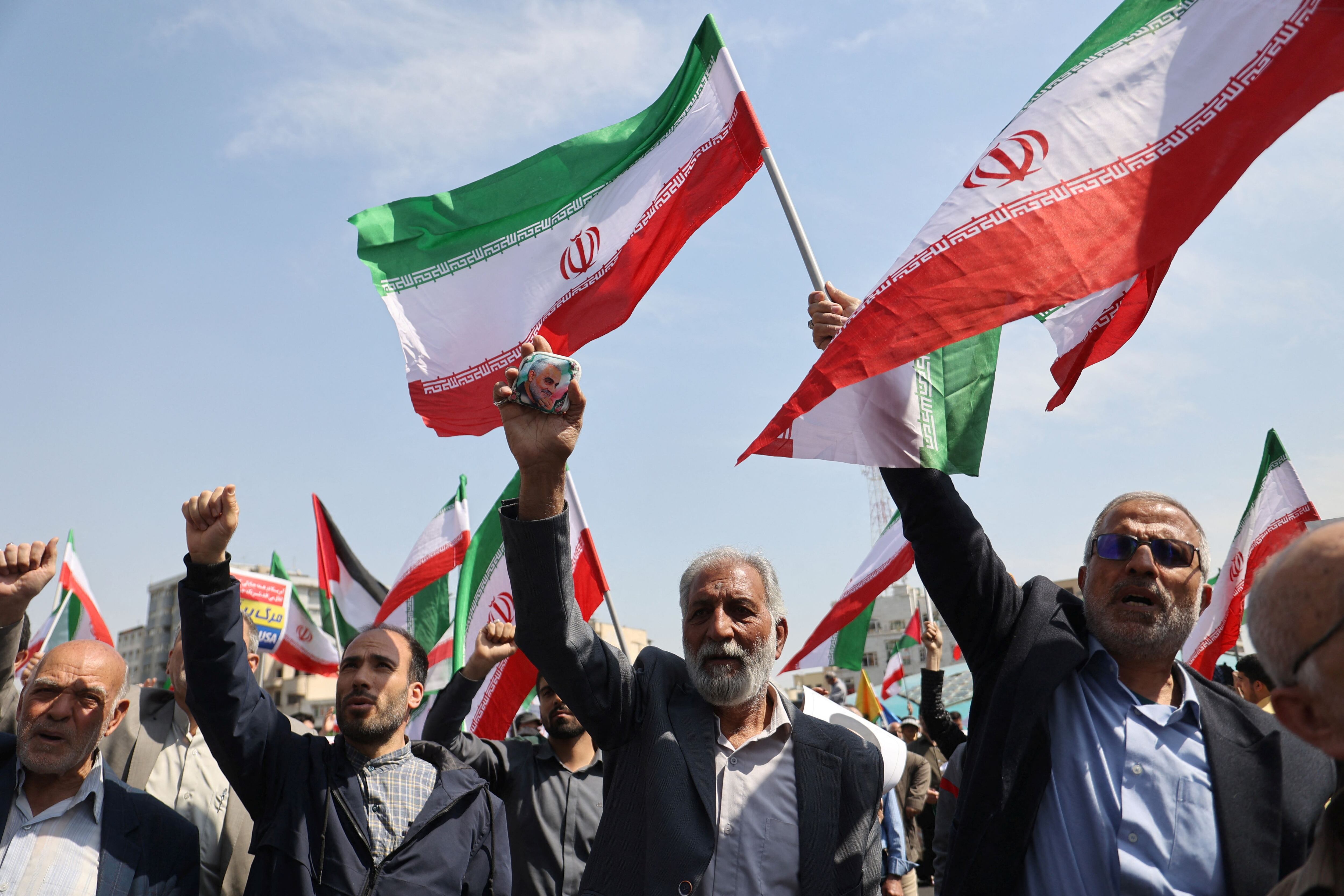 Iraníes en una manifestación antiisraelí en Teherán, Irán (Majid Asgaripour/WANA (West Asia News Agency) via REUTERS)