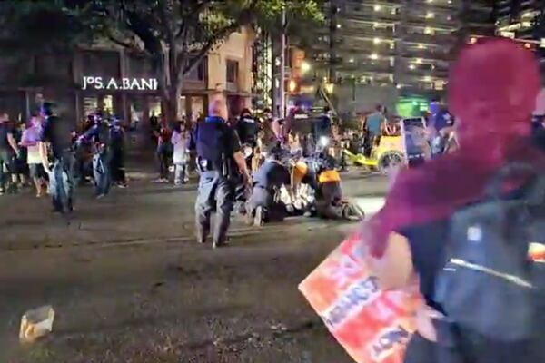Police and protesters gather around a demonstrator who got shot after several shots were fired during a Black Lives Matter protest in downtown Austin, Texas, U.S., July 25, 2020 in this screen grab obtained from a social media video. ImHiram / Hiram Gilberto / www.imhiram.com /via REUTERS THIS IMAGE HAS BEEN SUPPLIED BY A THIRD PARTY. MANDATORY CREDIT. NO RESALES. NO ARCHIVES.