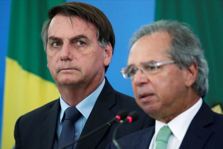 Jair Bolsonaro junto a su ministro de Economía Paulo Guedes (REUTERS/Ueslei Marcelino)