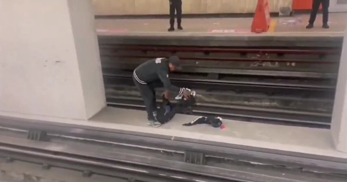 The moment they stopped a man coming down the subway tracks