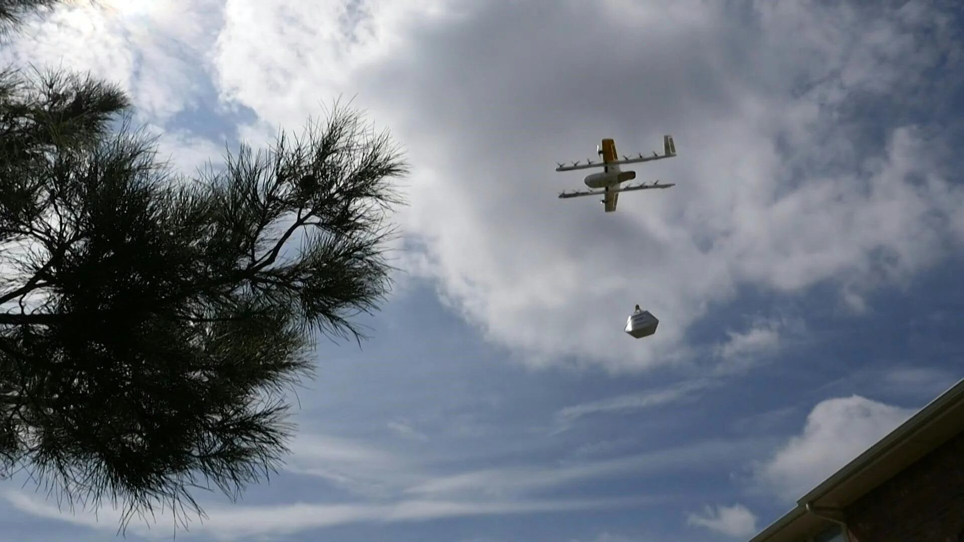 The small plane appeared in the blue sky above a house in Texas, deposited its load of snacks in the yard and sped off.  Drone deliveries are already a reality in the United States.