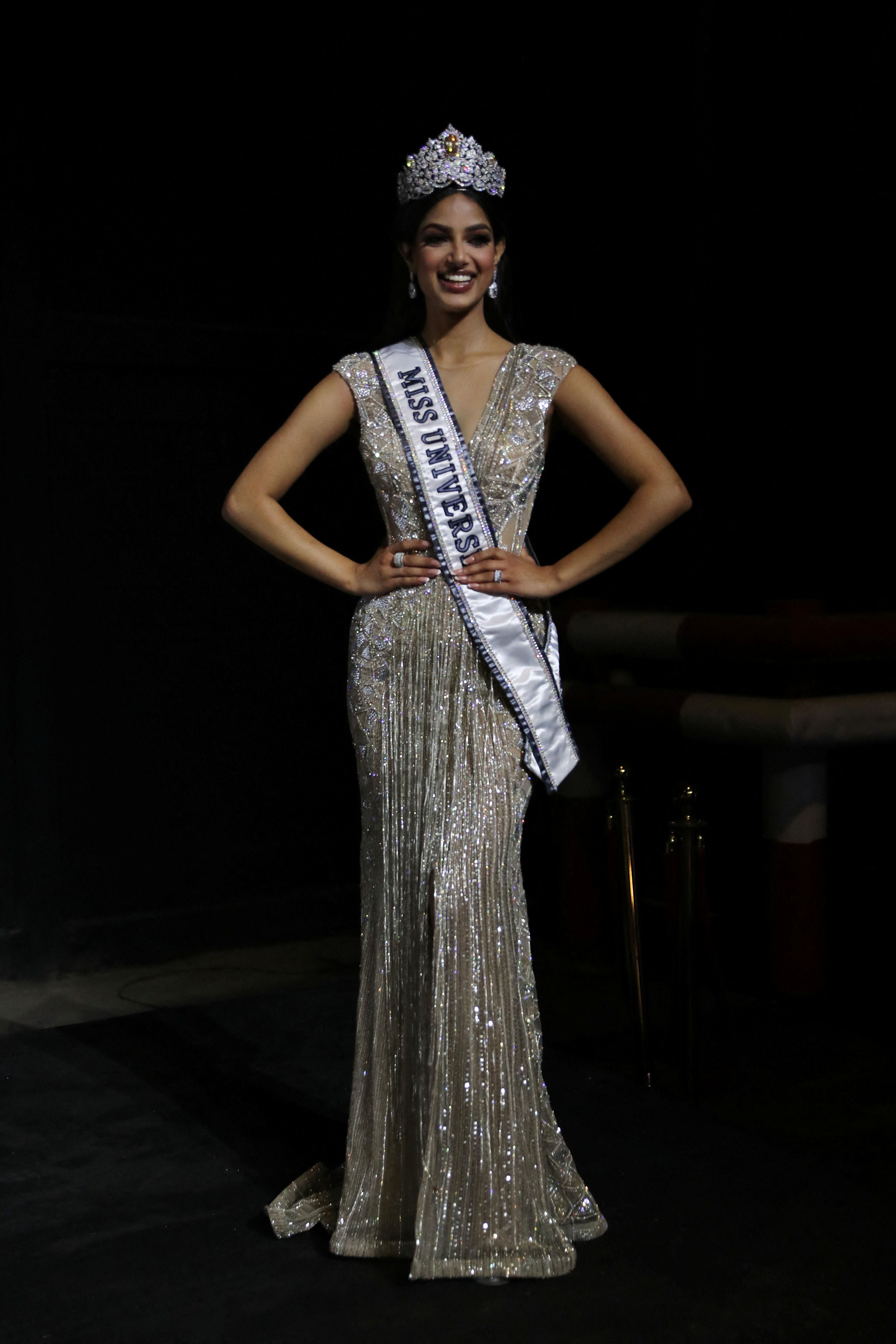 Miss Universe Harnaaz Sandhu of India poses at a press conference after winning the Miss Universe pageant, in the Red Sea resort of Eilat, Israel, on December 13, 2021. REUTERS / Ronen Zvulun